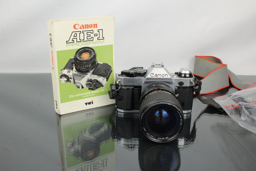 Canon AE - 1 Program + Tokina AT - X 28 - 85mm Canon FD mount lens - Dutch|Thrift