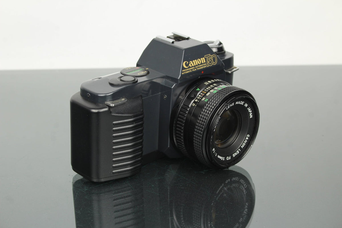 Canon T50 + 50mm 1.8 FD lens - Dutch|Thrift