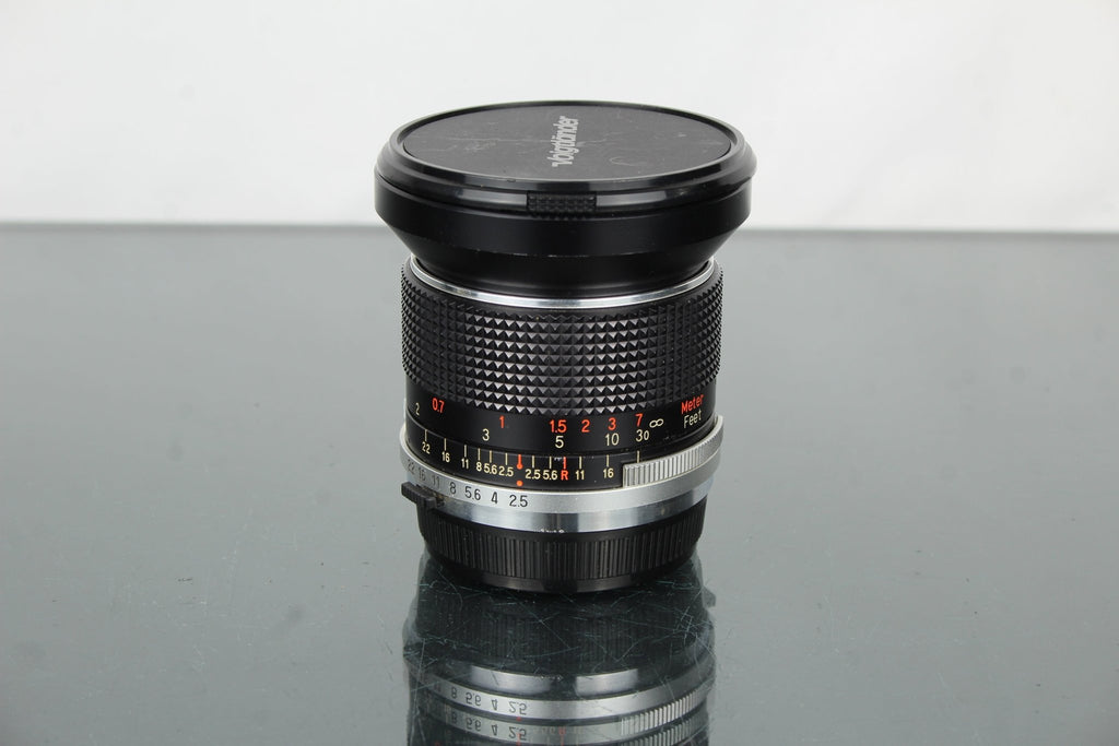 Panagor 28mm 1:2.5 OM mount - Dutch|Thrift